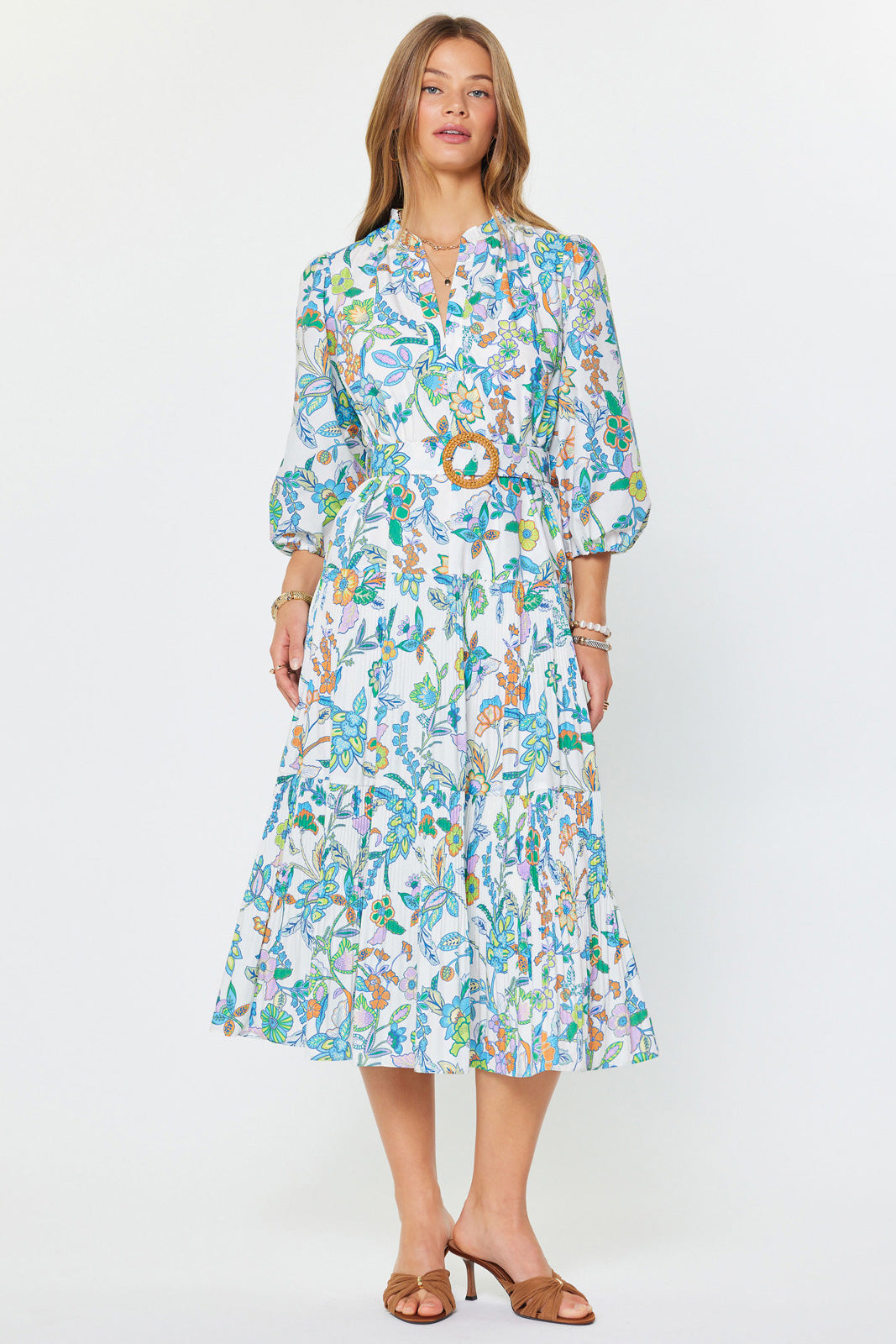 Woman wearing a floral dress on a white background