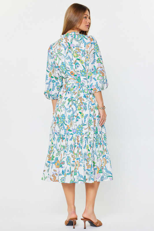 Woman wearing a floral dress on a white background