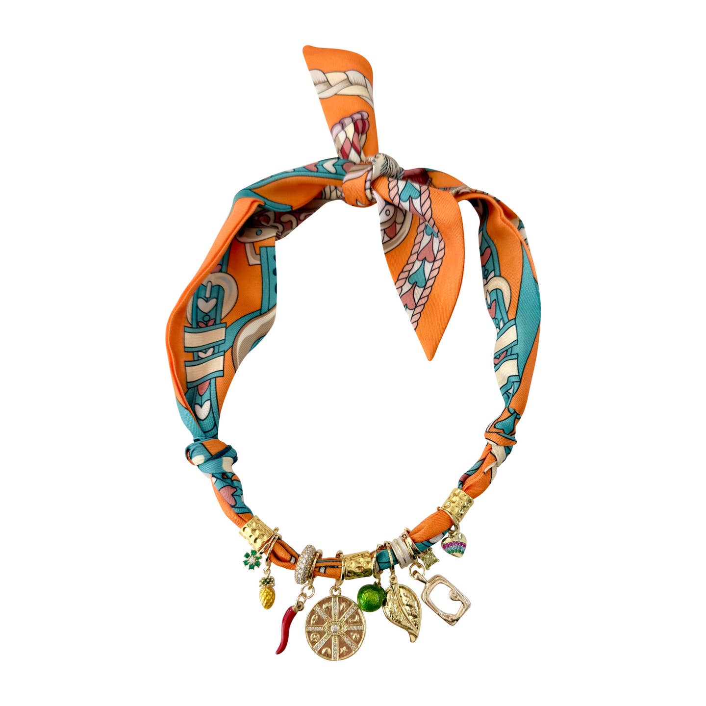 Colorful scarf necklace with decorative charms on a white background