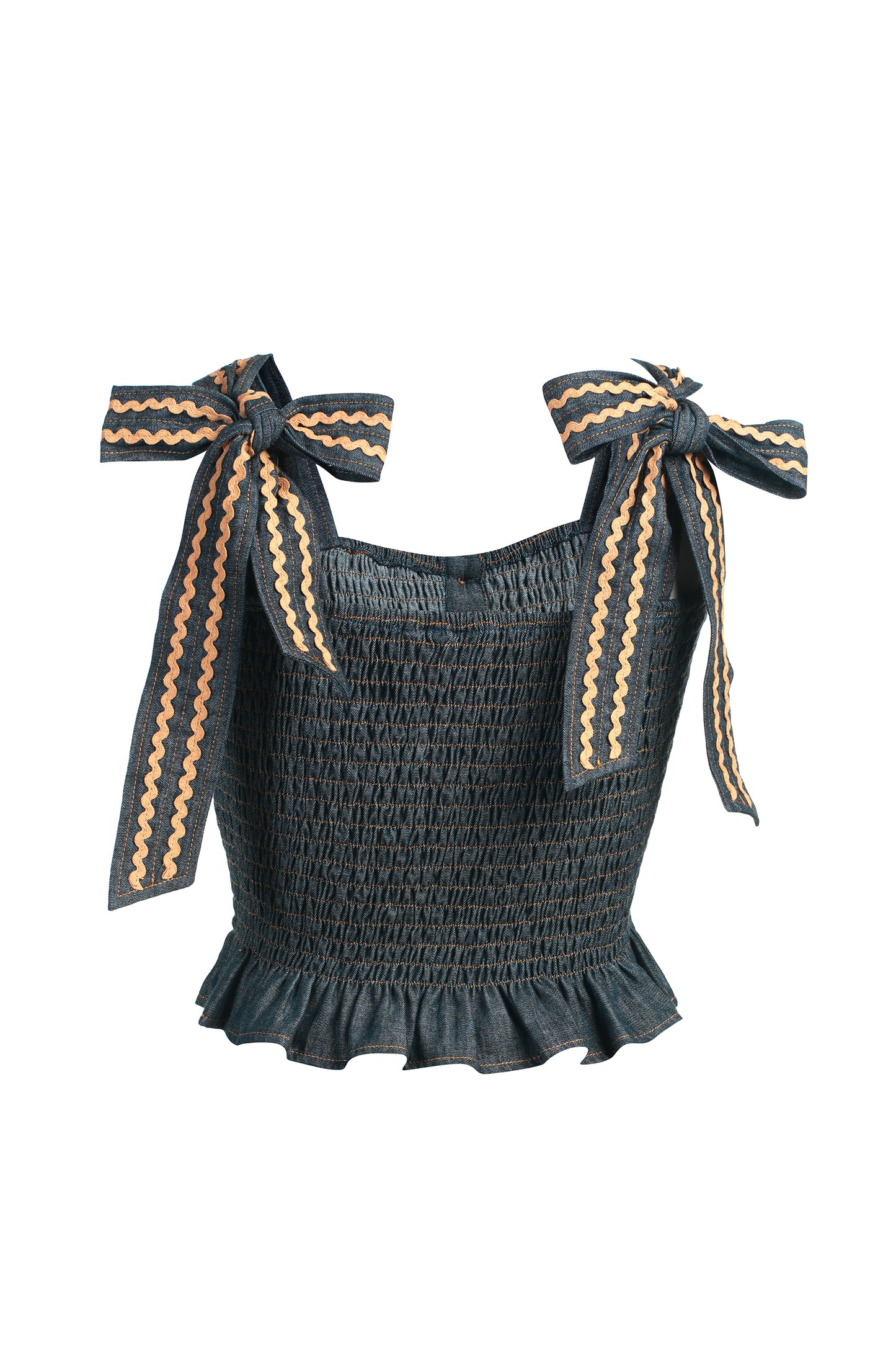 Denim smocked top with bow straps on a white background