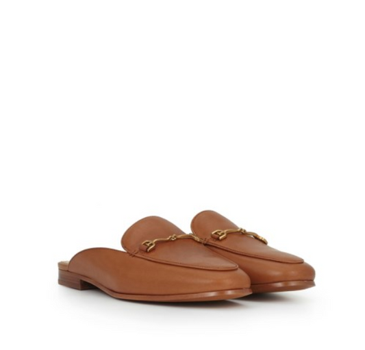 Pair of brown leather loafers with a gold chain on a white background